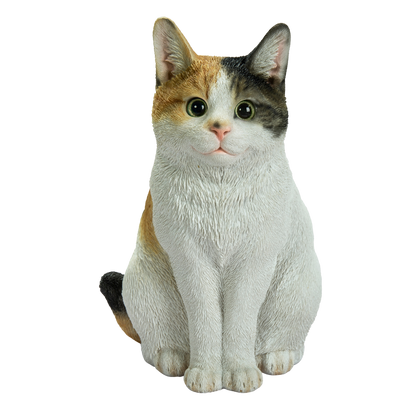 お座り三毛猫