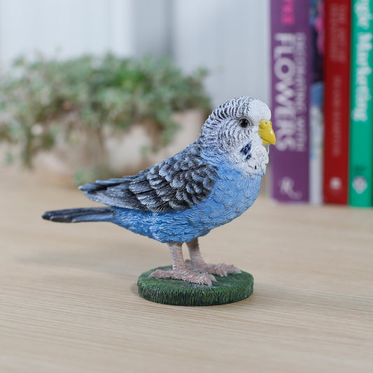 揺れる青いセキセイインコ